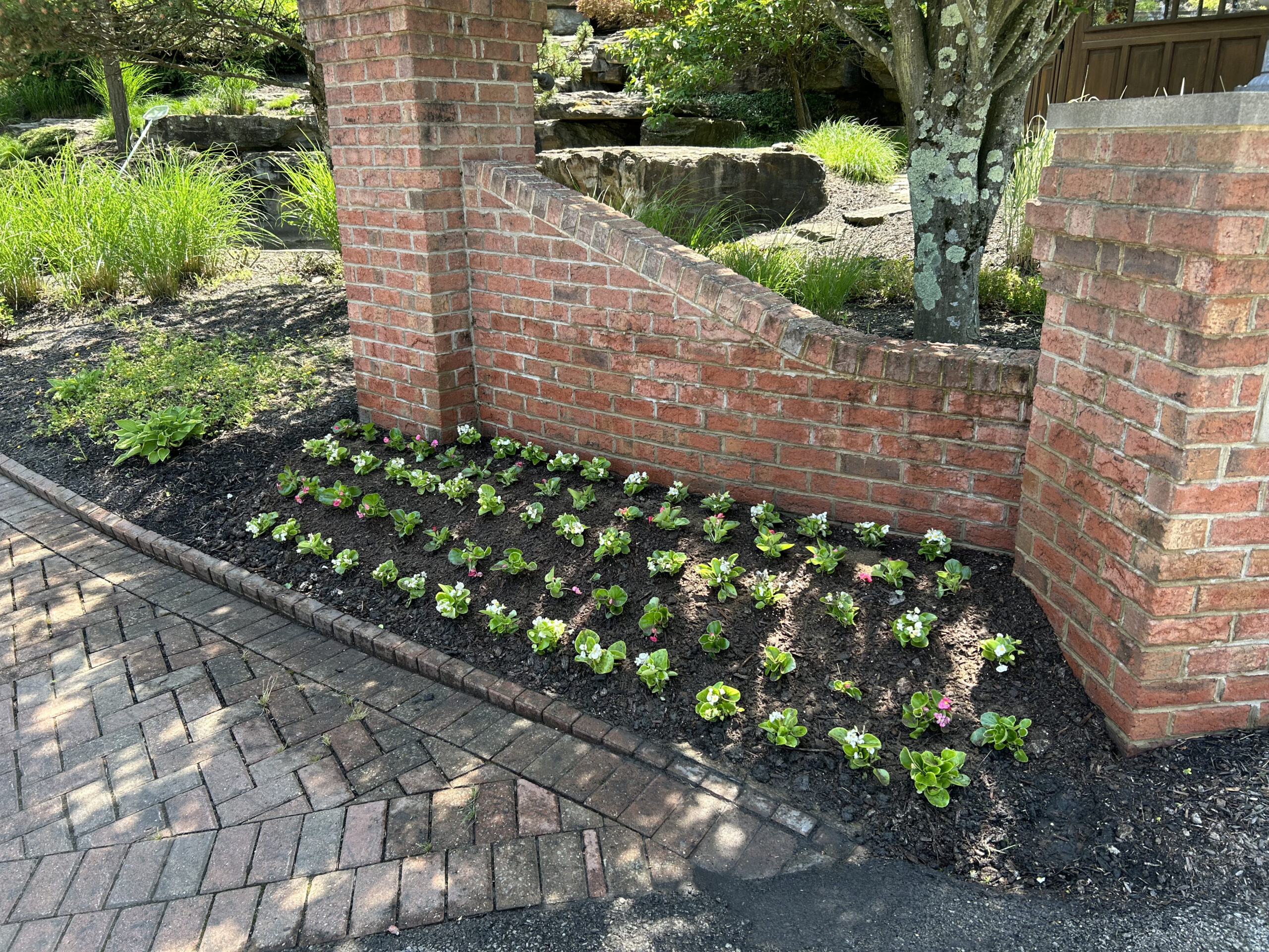 Custom landscape design with patios and retaining walls